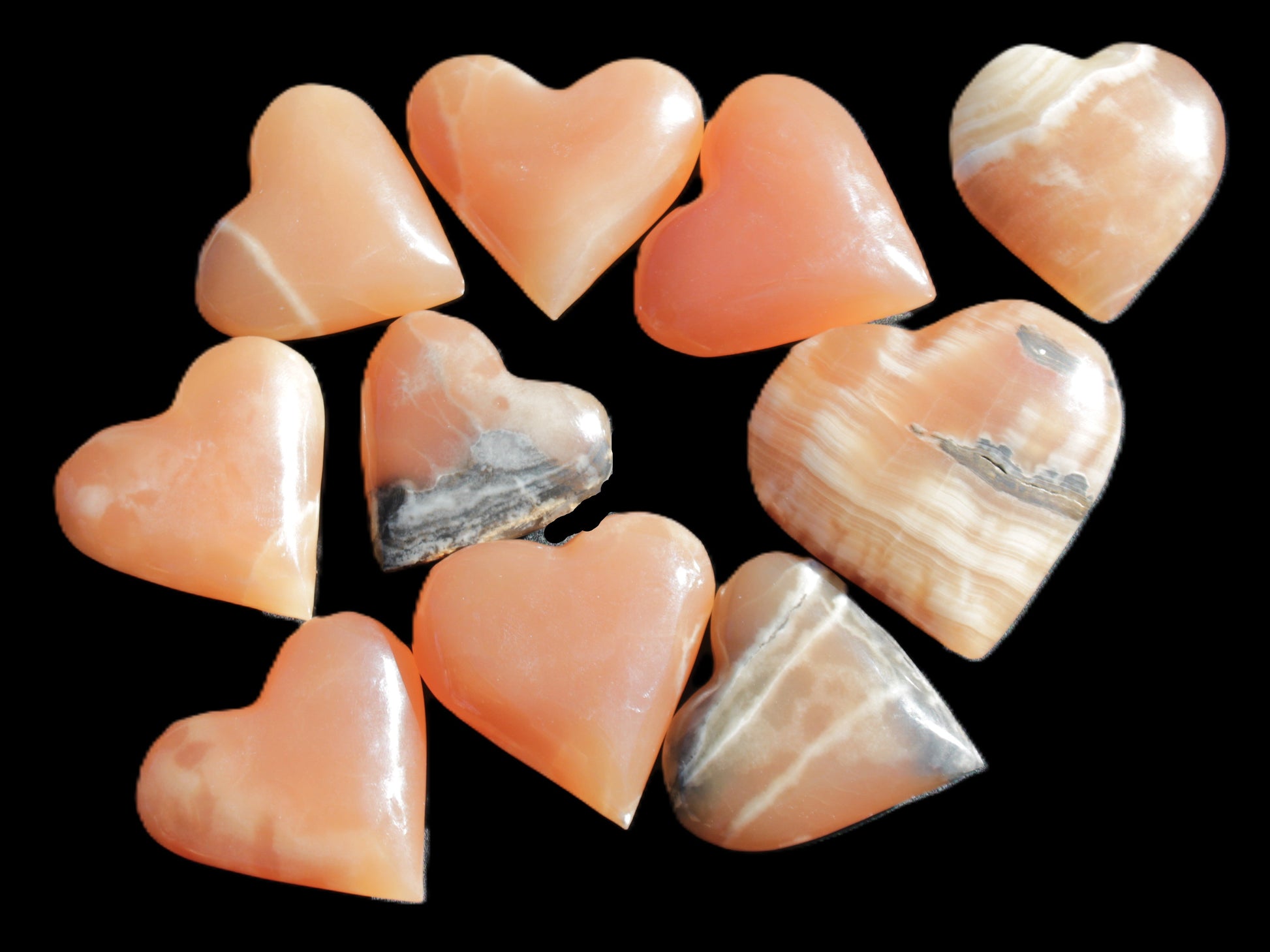 Ten Honey Calcite hearts selection 53-60mm 969g Wholesale Rocks and Things Store