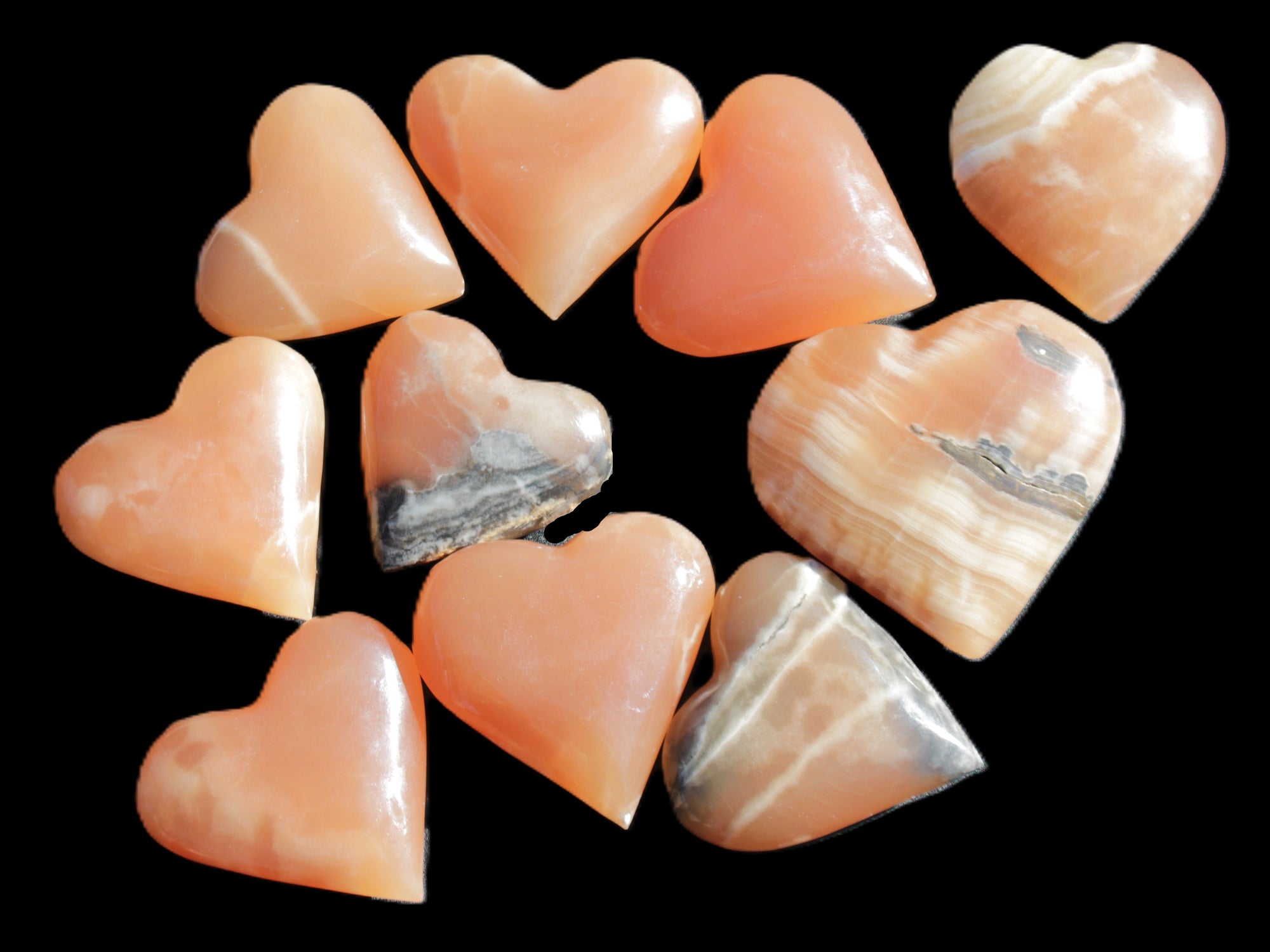 Ten Honey Calcite hearts selection 53-60mm 969g Wholesale Rocks and Things Store