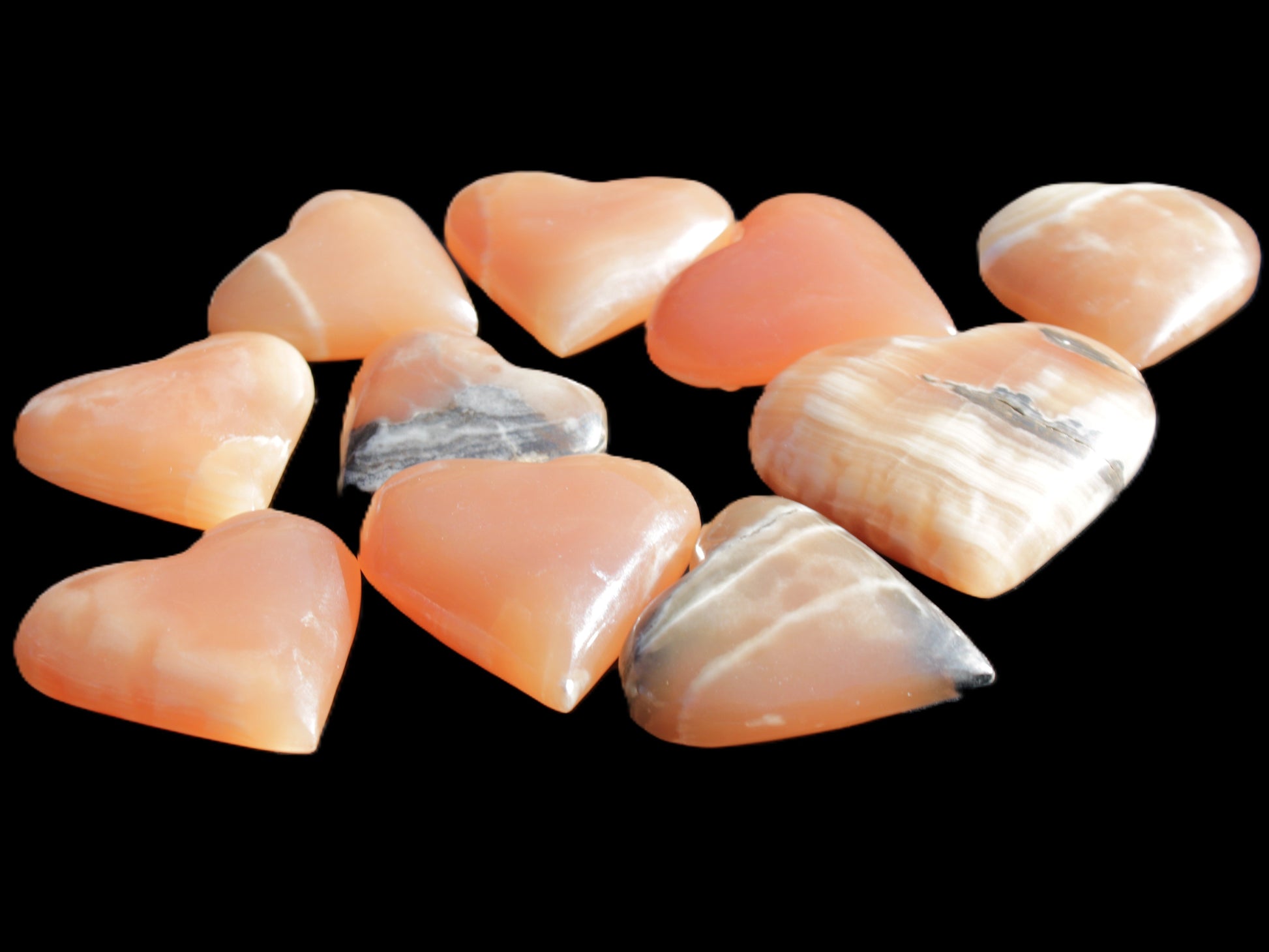 Ten Honey Calcite hearts selection 53-60mm 969g Wholesale Rocks and Things Store