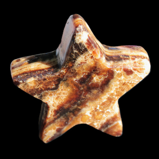 Chocolate Calcite Star 67*19mm 114.0g in sunlight - Rocks and Things Store