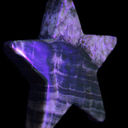 Chocolate Calcite Star 103*18mm 237.7g in sunlight - Rocks and Things Store