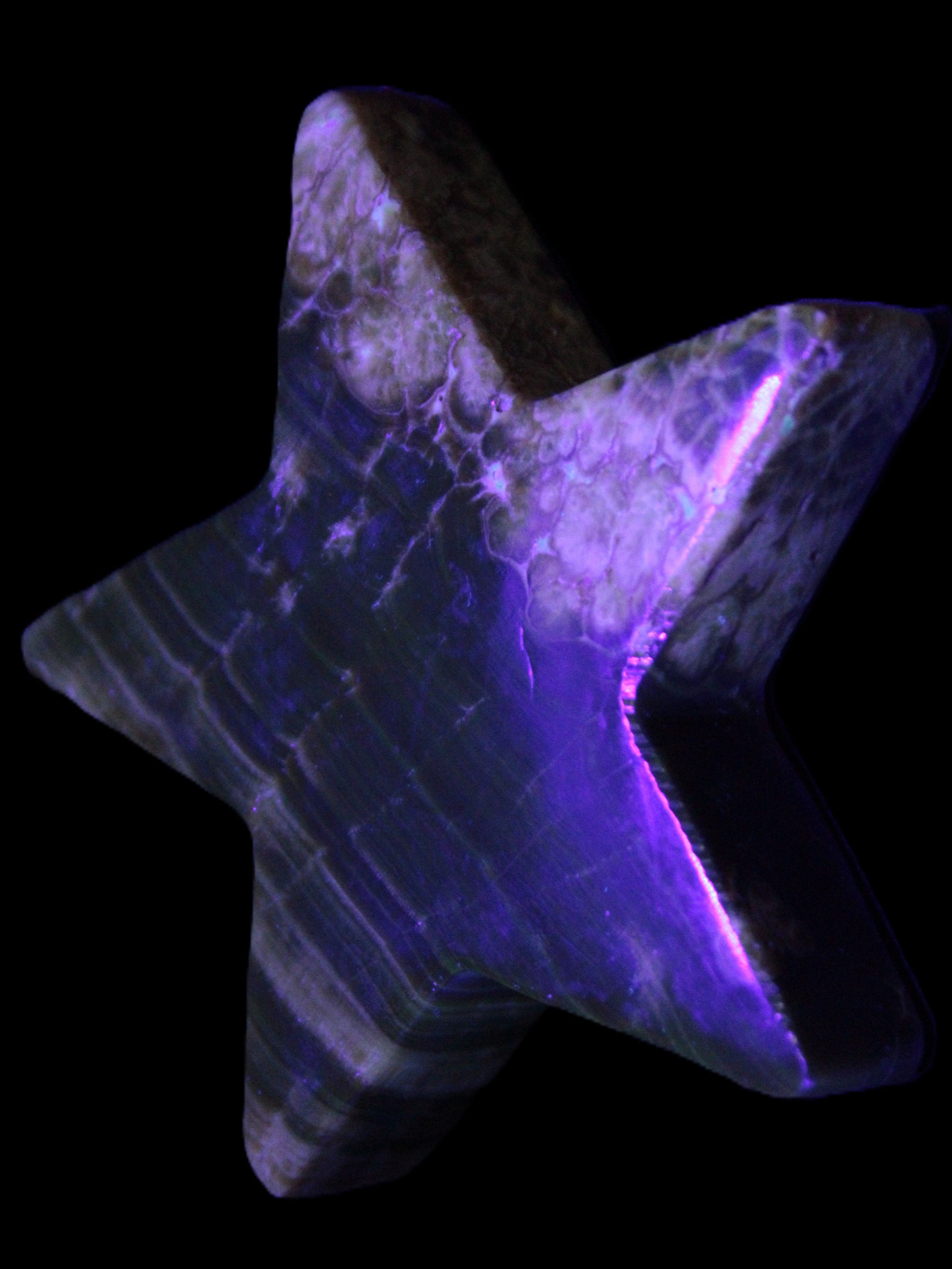 Chocolate Calcite Star 103*18mm 237.7g in UV light - Rocks and Things Store
