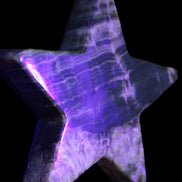 Chocolate Calcite Star 103*18mm 237.7g in sunlight - Rocks and Things Store