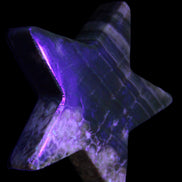 Chocolate Calcite Star 103*18mm 237.7g in sunlight - Rocks and Things Store