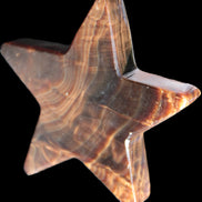 Chocolate Calcite Star 103*19mm 243.3g in very bright sunshine - Rocks and Things Store