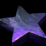 Chocolate Calcite Star 103*19mm 243.3g in UV light - Rocks and Things Store