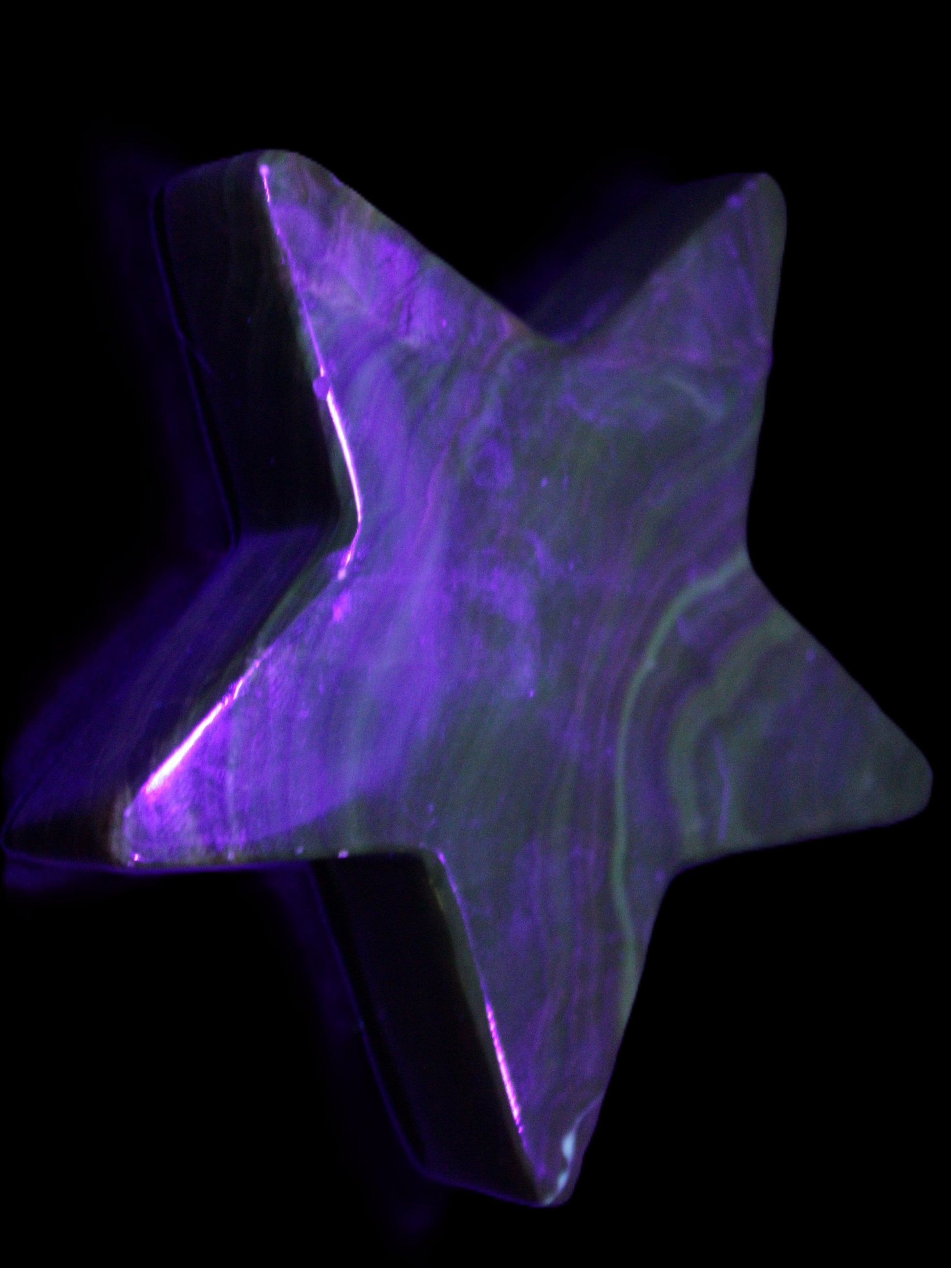 Chocolate Calcite Star 103*19mm 243.3g in UV light - Rocks and Things Store