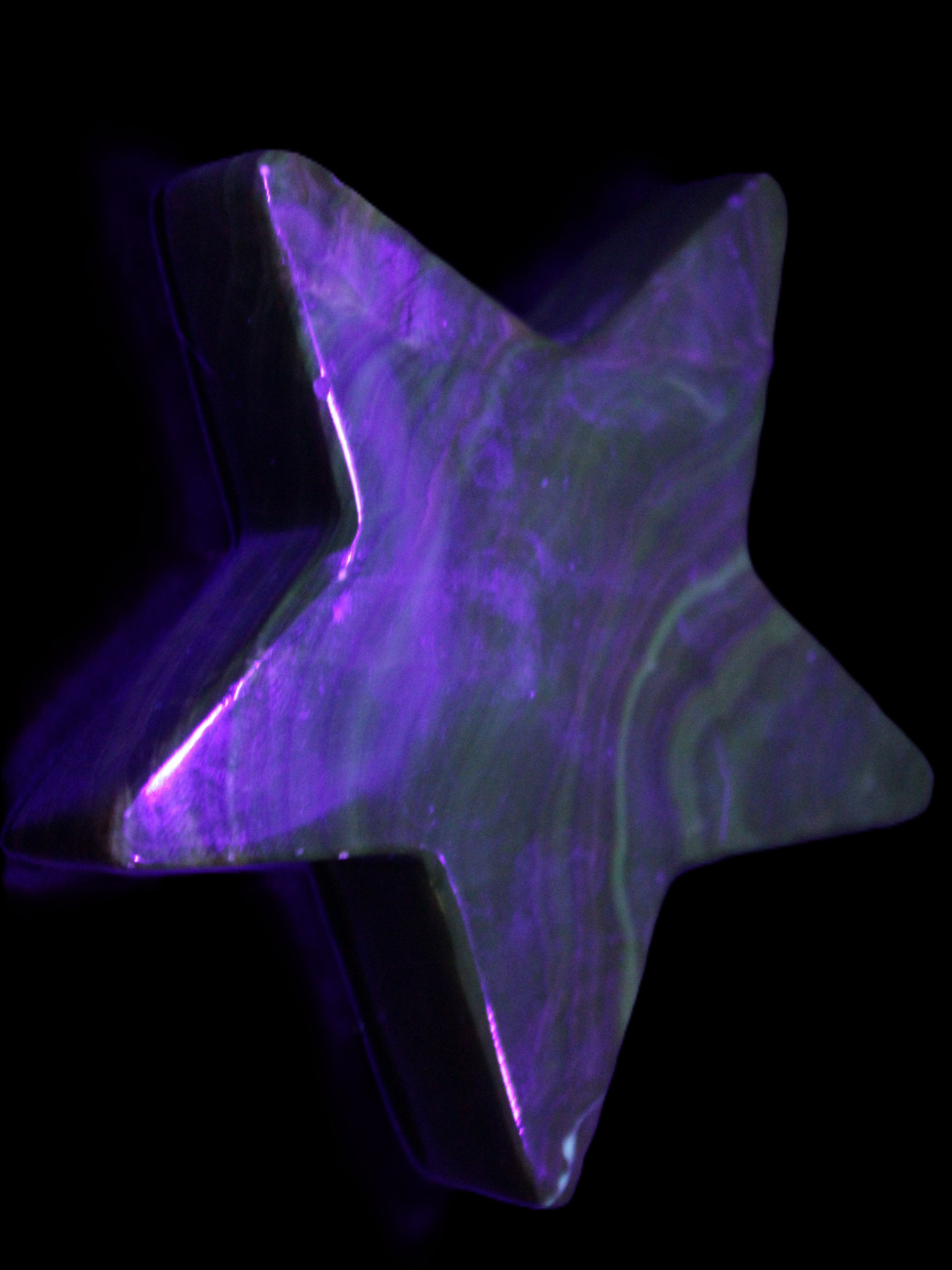 Chocolate Calcite Star 103*19mm 243.3g in UV light - Rocks and Things Store