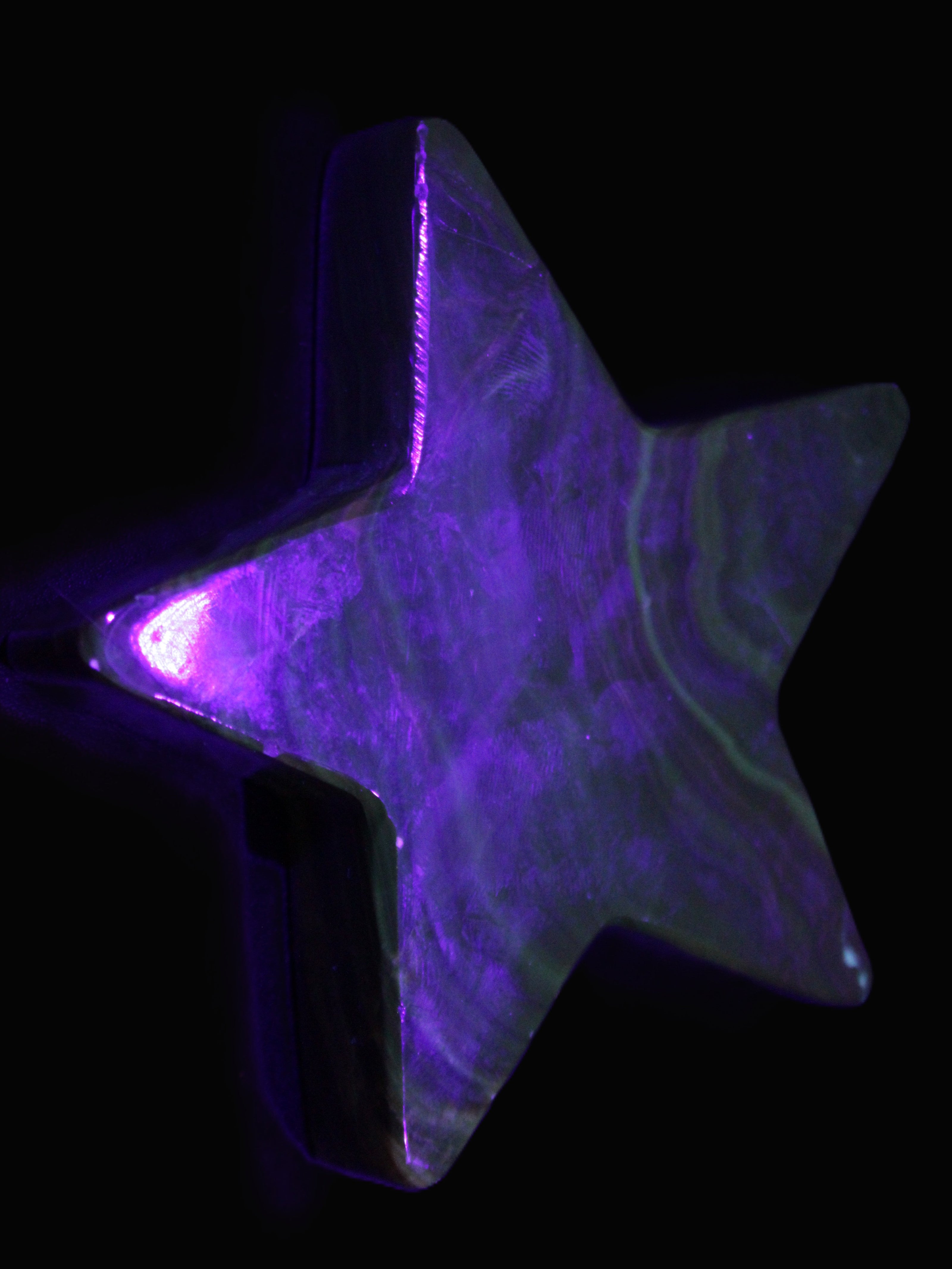 Chocolate Calcite Star 103*19mm 243.3g in UV light - Rocks and Things Store