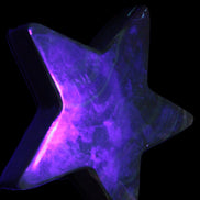 Chocolate Calcite Star 103*19mm 243.3g in UV light - Rocks and Things Store