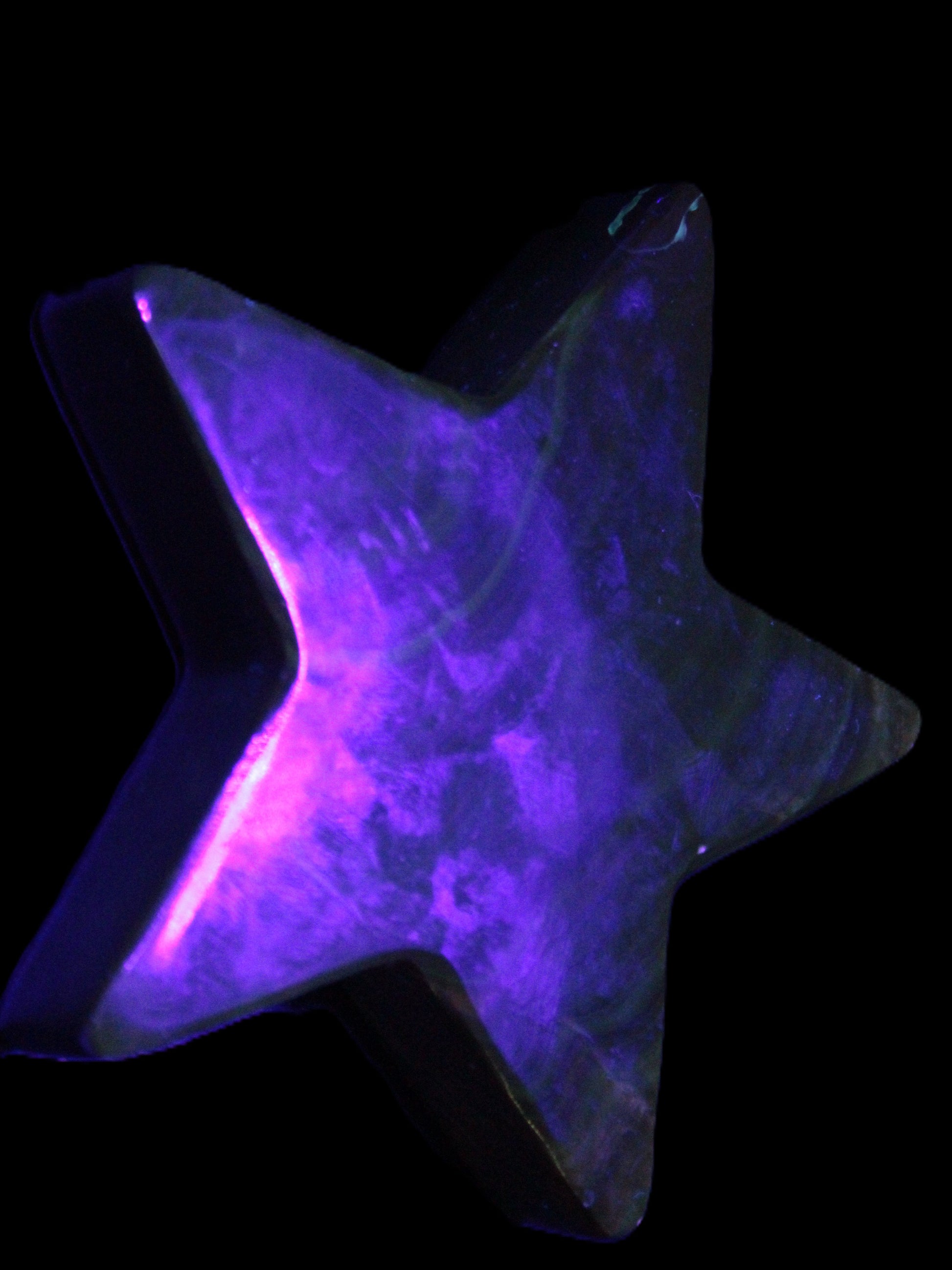 Chocolate Calcite Star 103*19mm 243.3g in UV light - Rocks and Things Store