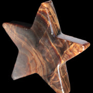 Chocolate Calcite Star 103*19mm 243.3g in very bright sunshine - Rocks and Things Store