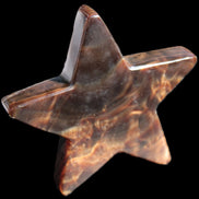 Chocolate Calcite Star 103*19mm 243.3g in very bright sunshine - Rocks and Things Store