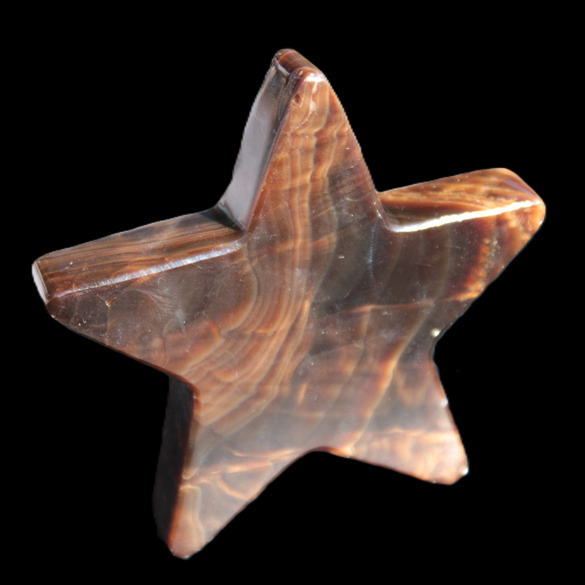 Chocolate Calcite Star 103*19mm 243.3g in very bright sunshine - Rocks and Things Store