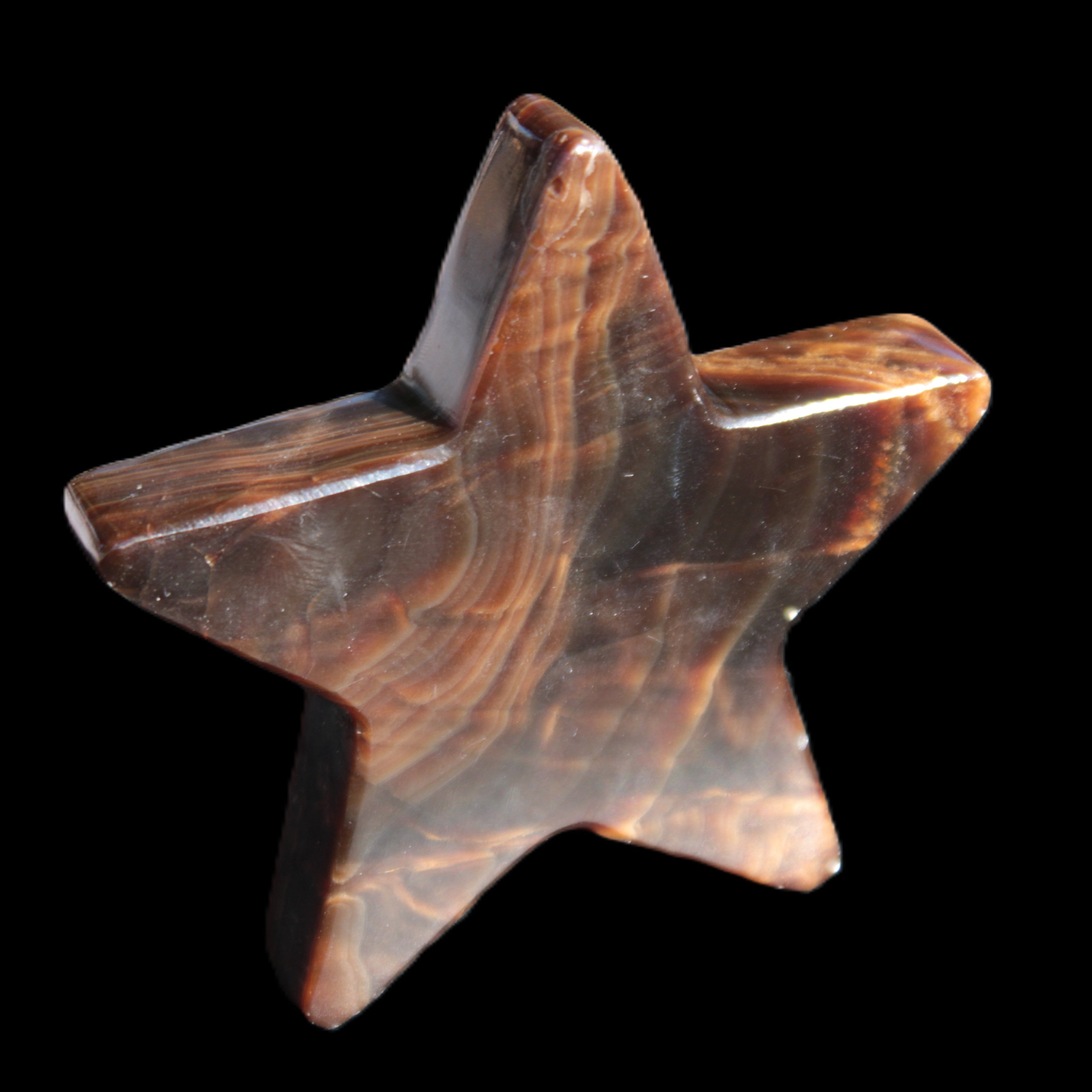 Chocolate Calcite Star 103*19mm 243.3g in very bright sunshine - Rocks and Things Store