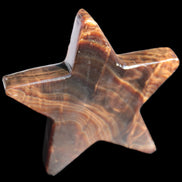 Chocolate Calcite Star 103*19mm 243.3g in very bright sunshine - Rocks and Things Store