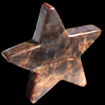 Chocolate Calcite Star 103*19mm 243.3g in very bright sunshine - Rocks and Things Store