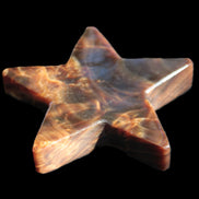 Chocolate Calcite Star 103*19mm 243.3g in very bright sunshine - Rocks and Things Store