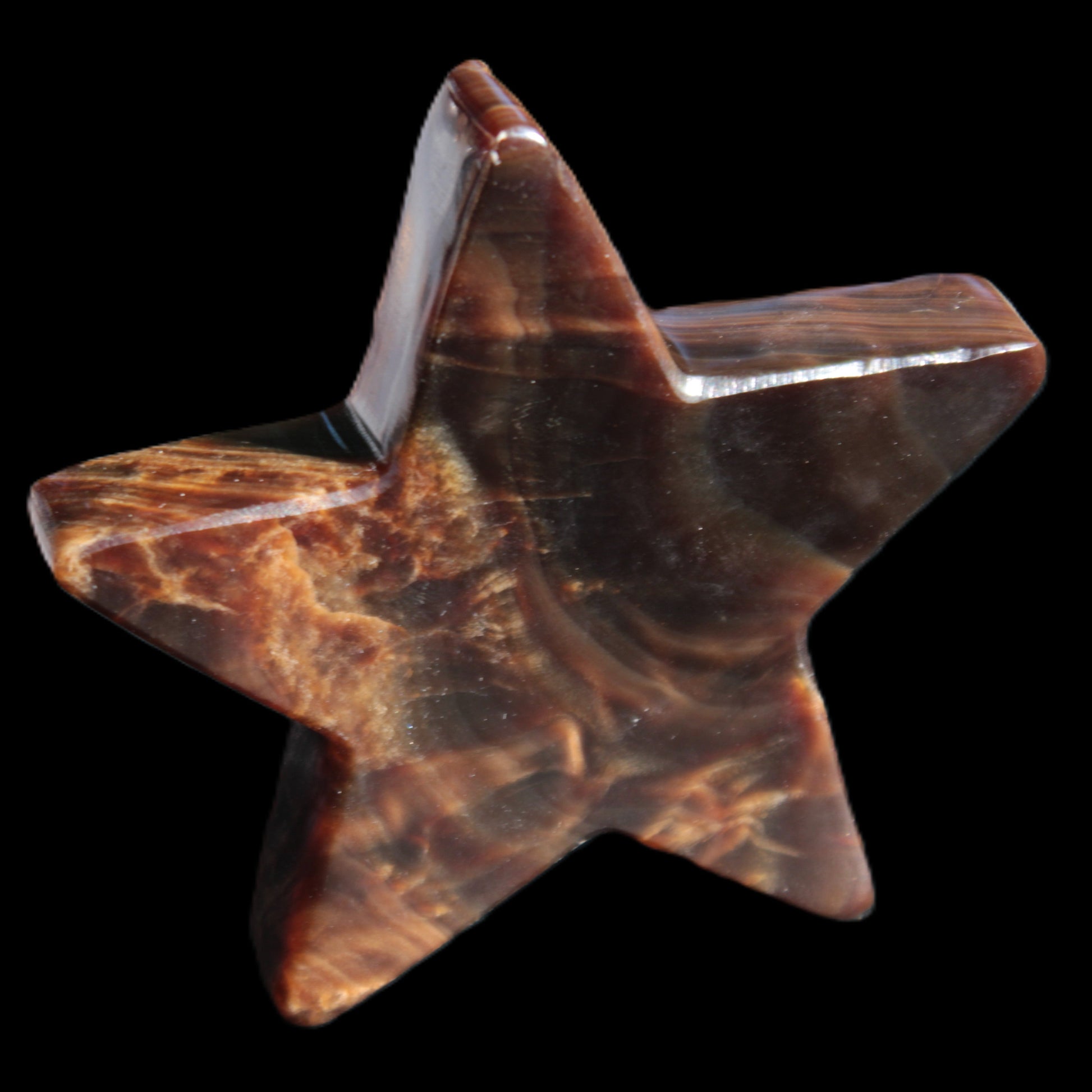 Chocolate Calcite Star 103*19mm 243.3g in very bright sunshine - Rocks and Things Store