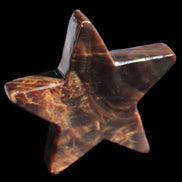 Chocolate Calcite Star 103*19mm 243.3g in very bright sunshine - Rocks and Things Store