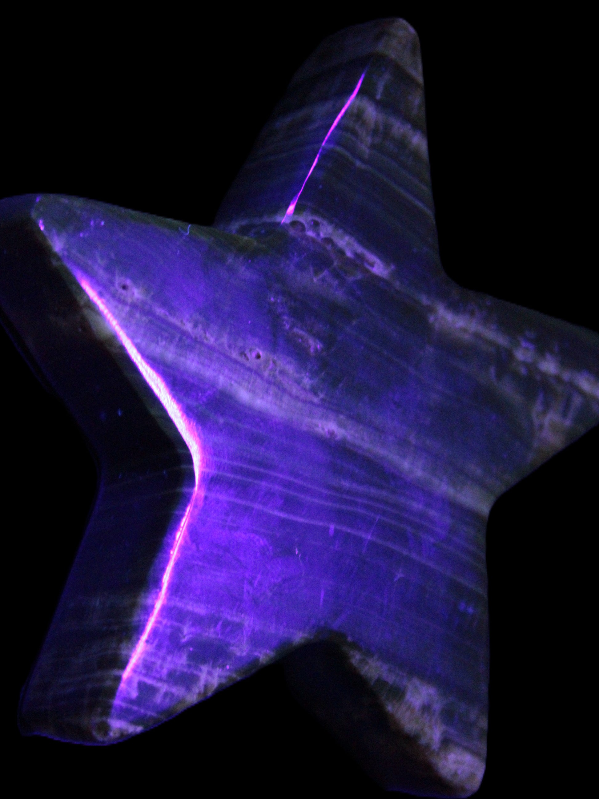 Chocolate Calcite Star 103*18mm 249.6g in UV light - Rocks and Things Store