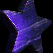 Chocolate Calcite Star 103*18mm 249.6g in UV light - Rocks and Things Store