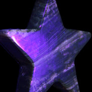 Chocolate Calcite Star 103*18mm 249.6g in UV light - Rocks and Things Store