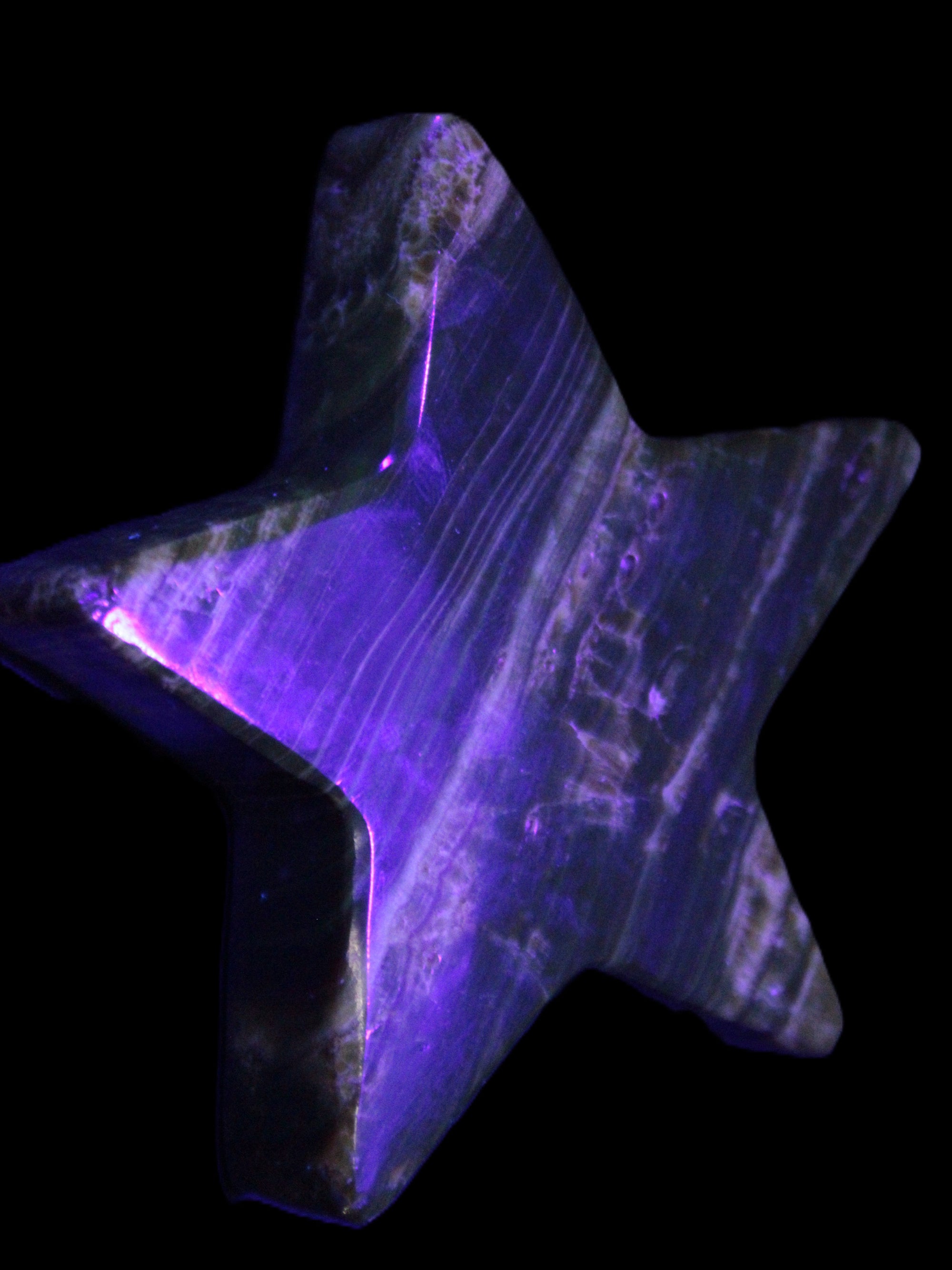 Chocolate Calcite Star 103*18mm 249.6g in UV light - Rocks and Things Store