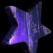 Chocolate Calcite Star 103*18mm 249.6g in UV light - Rocks and Things Store