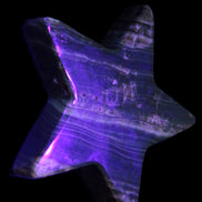 Chocolate Calcite Star 103*18mm 249.6g in UV light - Rocks and Things Store
