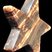 Chocolate Calcite Star 103*18mm 249.6g in bright sunshine - Rocks and Things Store