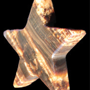 Chocolate Calcite Star 103*18mm 249.6g in bright sunshine - Rocks and Things Store