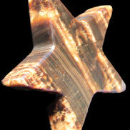 Chocolate Calcite Star 103*18mm 249.6g in bright sunshine - Rocks and Things Store