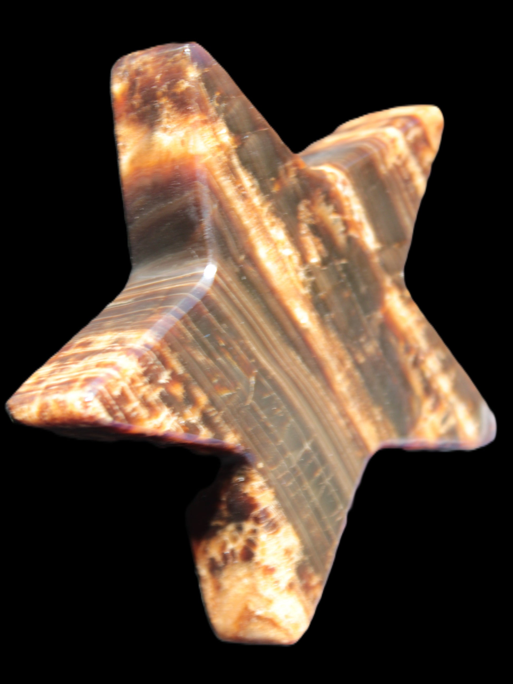 Chocolate Calcite Star 103*18mm 249.6g in bright sunshine - Rocks and Things Store
