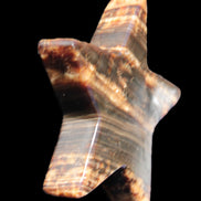 Chocolate Calcite Star 103*18mm 249.6g in bright sunshine - Rocks and Things Store