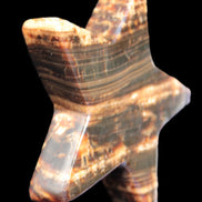 Chocolate Calcite Star 103*18mm 249.6g in bright sunshine - Rocks and Things Store