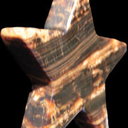 Chocolate Calcite Star 103*18mm 249.6g in bright sunshine - Rocks and Things Store