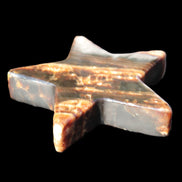 Chocolate Calcite Star 103*18mm 249.6g in bright sunshine - Rocks and Things Store