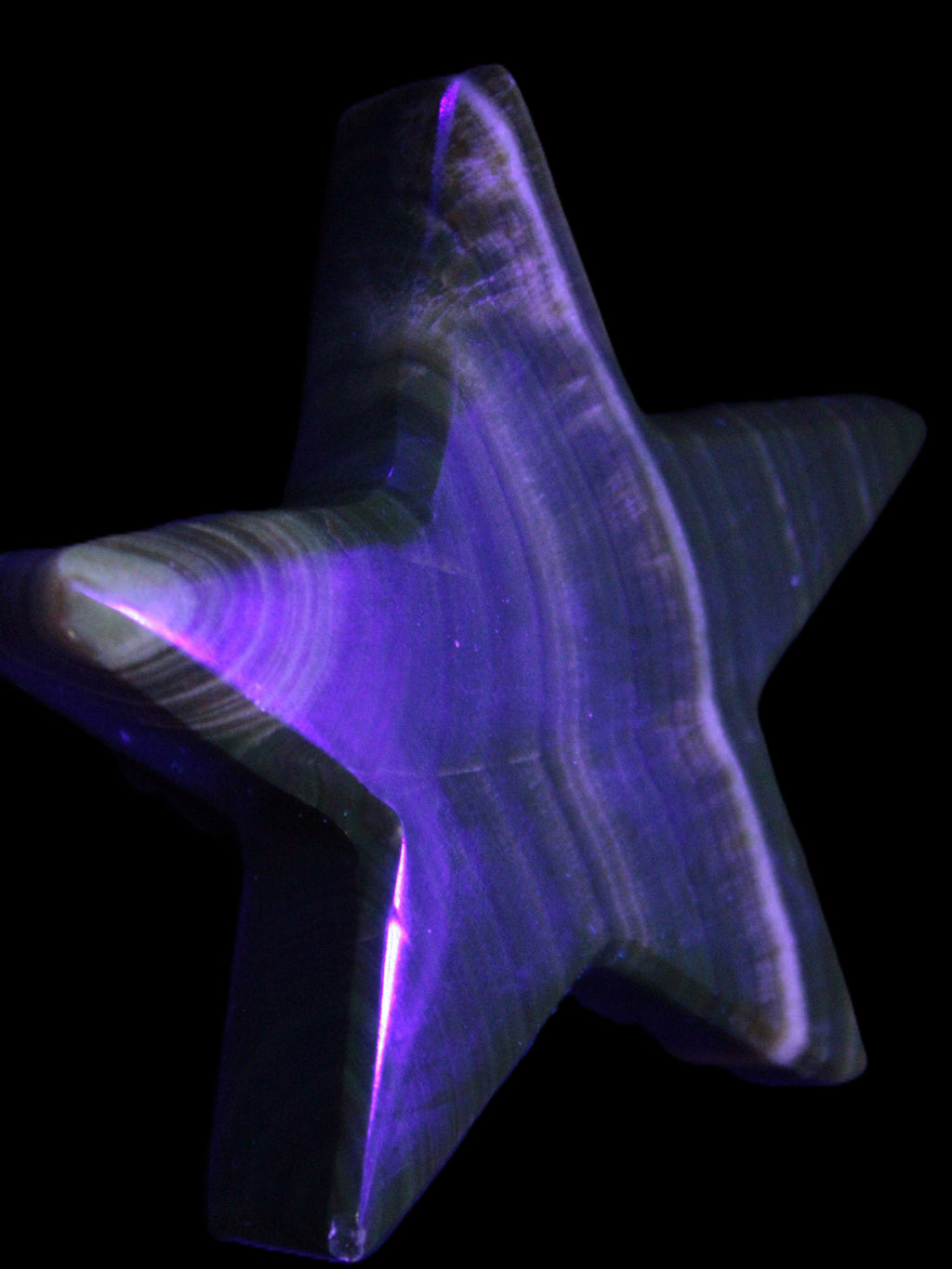 Chocolate Calcite Star 105*20mm 266.5g in UV light - Rocks and Things Store