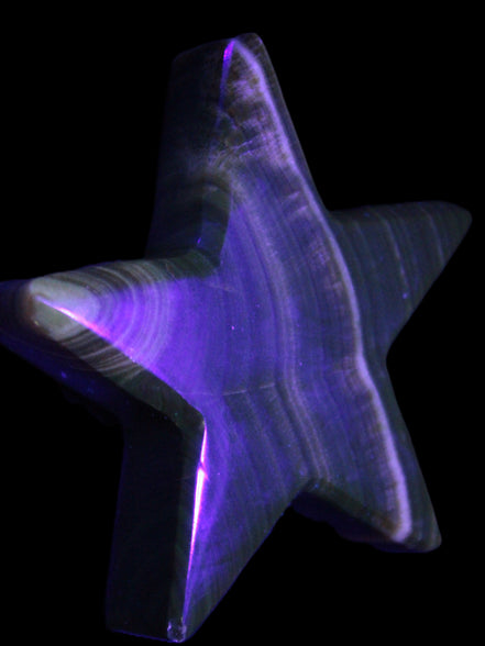 Chocolate Calcite Star 105*20mm 266.5g in UV light - Rocks and Things Store