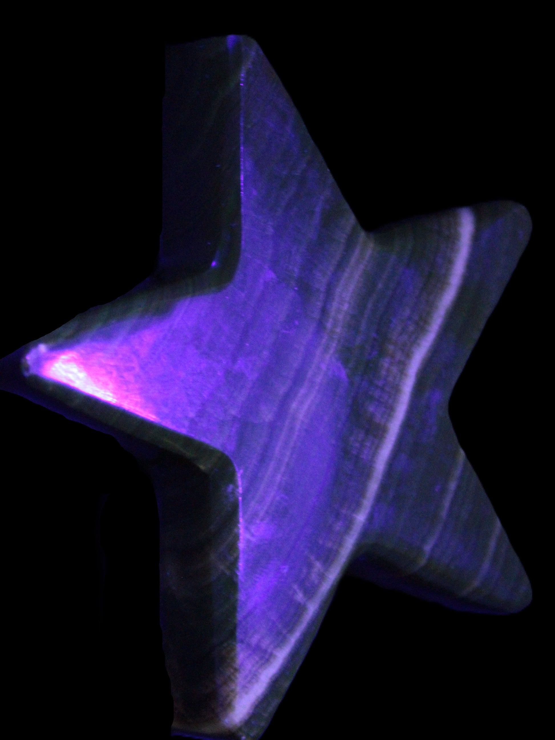 Chocolate Calcite Star 105*20mm 266.5g in UV light - Rocks and Things Store