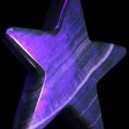 Chocolate Calcite Star 105*20mm 266.5g in UV light - Rocks and Things Store