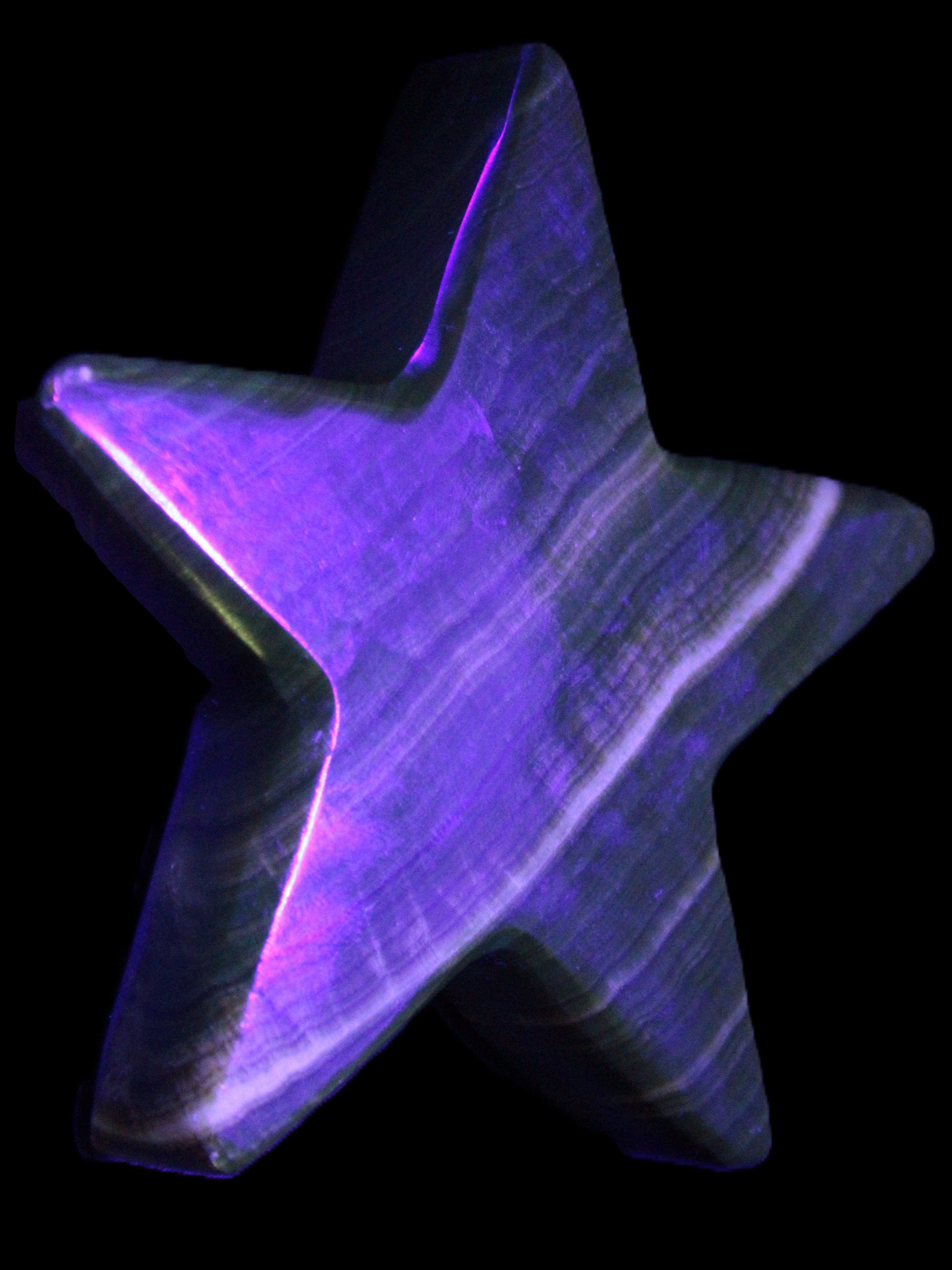 Chocolate Calcite Star 105*20mm 266.5g in UV light - Rocks and Things Store