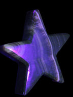 Chocolate Calcite Star 105*20mm 266.5g in UV light - Rocks and Things Store