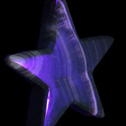 Chocolate Calcite Star 105*20mm 266.5g in UV light - Rocks and Things Store