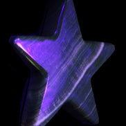 Chocolate Calcite Star 105*20mm 266.5g in UV light - Rocks and Things Store