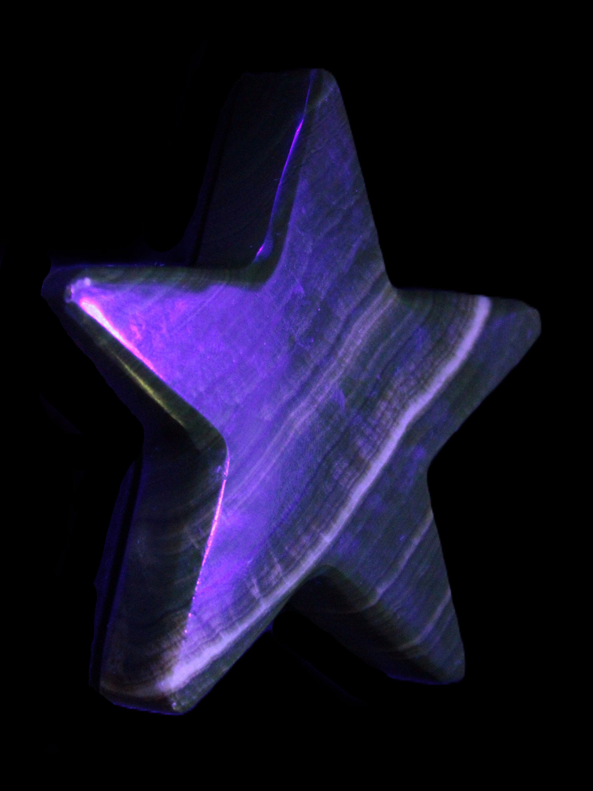 Chocolate Calcite Star 105*20mm 266.5g in UV light - Rocks and Things Store