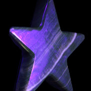 Chocolate Calcite Star 105*20mm 266.5g in UV light - Rocks and Things Store