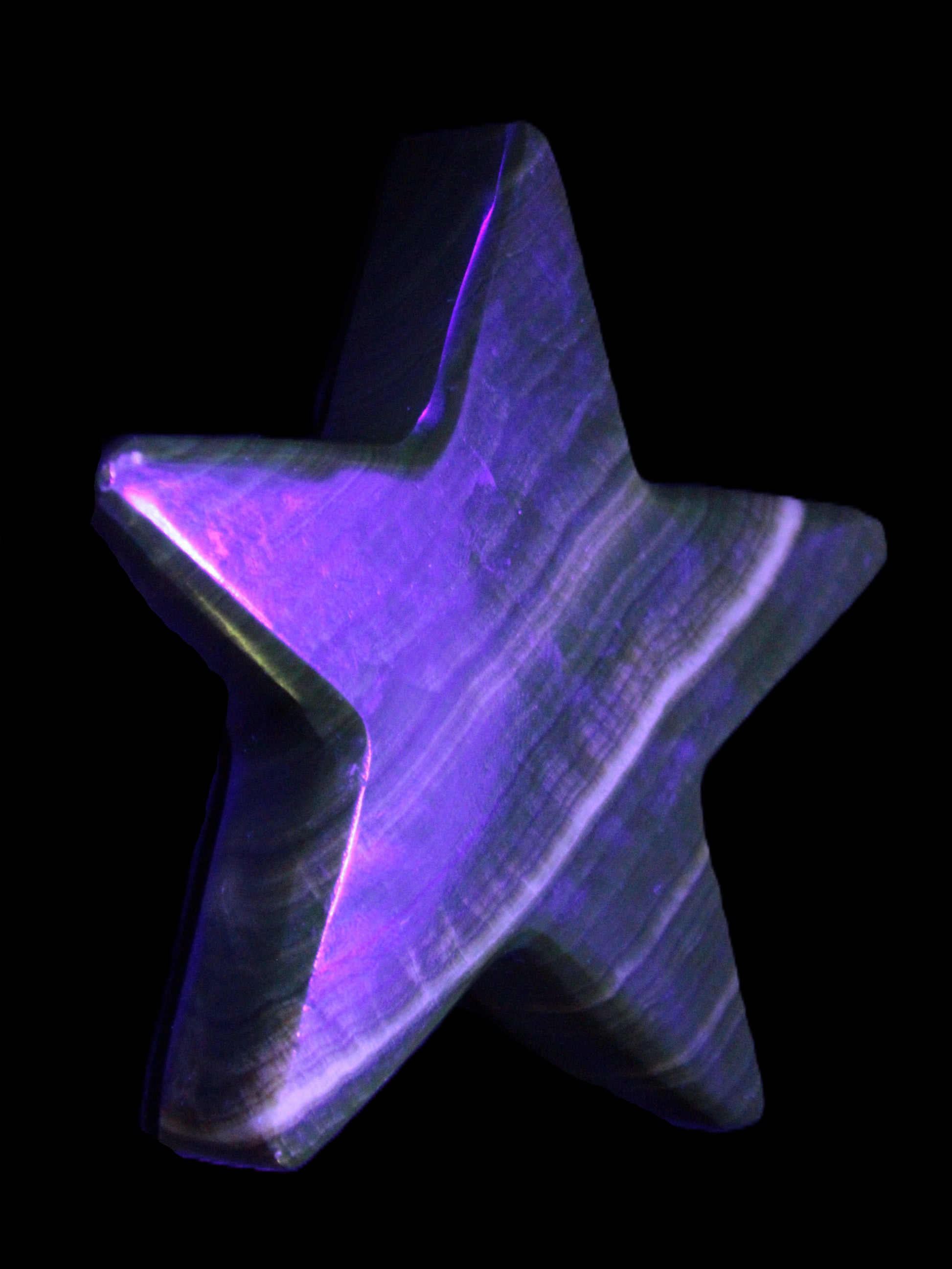 Chocolate Calcite Star 105*20mm 266.5g in UV light - Rocks and Things Store