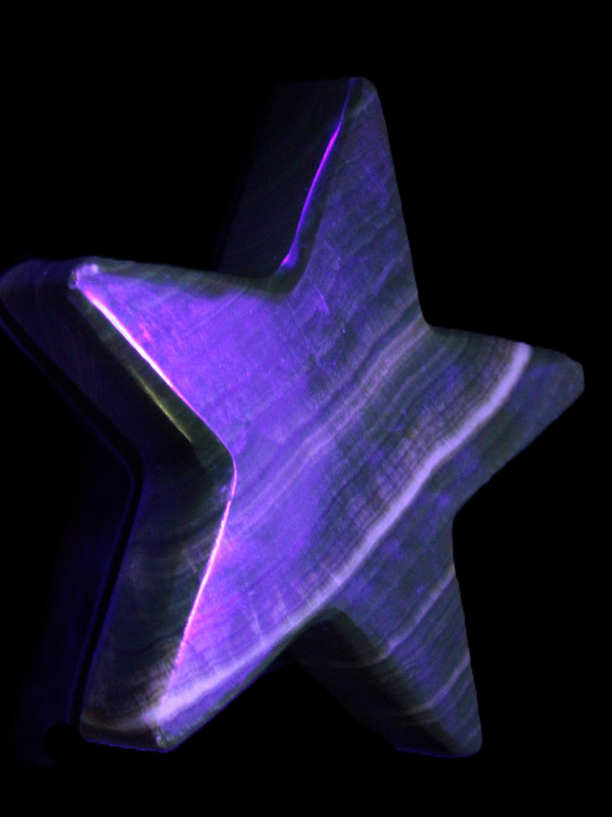Chocolate Calcite Star 105*20mm 266.5g in UV light - Rocks and Things Store